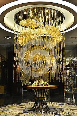 Luxury crystal chandelier lighting in shop hall Stock Photo