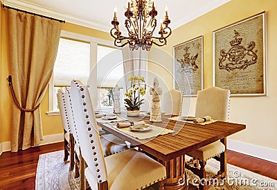 Luxury dining room with carved wood table Stock Photo