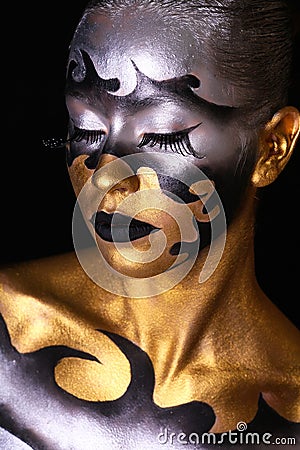 Luxury Golden Makeup. Beautiful Professional Holiday Make-up Stock Photo