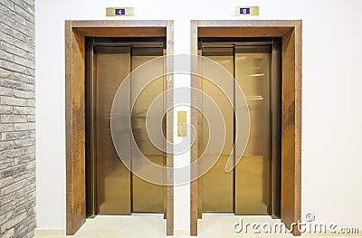Luxury golden passenger lift door Stock Photo