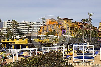 Luxury holiday hotel accommodation with a recreation area planted with beautiful sub tropical flowers and shrubs in Teneriffe Editorial Stock Photo