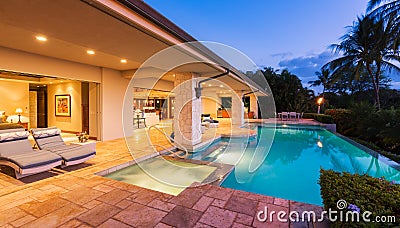 Luxury Home with Pool at Sunset Stock Photo