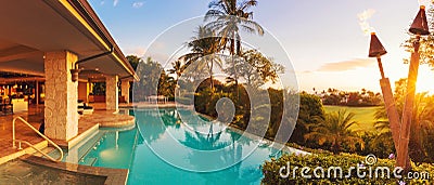 Luxury Home with Pool at Sunset Stock Photo