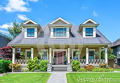 Luxury house with beautiful landscaping on a sunny day Stock Photo