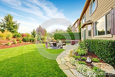 Luxury house exterior with impressive backyard landscape design Stock Photo