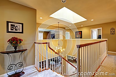 Luxury house interior. Upstairs hallway with staircase Stock Photo