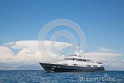 Luxury large super or mega motor yacht in the blue sea. Stock Photo