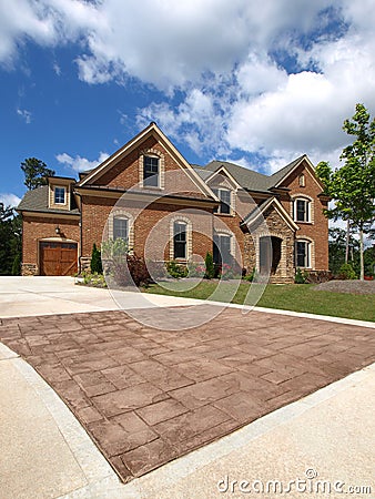 Luxury Model Home Exterior stone driveway Stock Photo