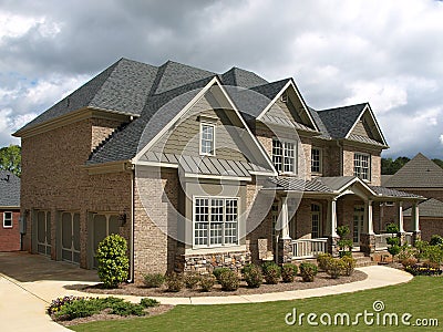 Luxury Model Home Exterior stormy weather angle Stock Photo