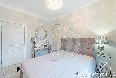 Luxury And Modern Bedroom Interior. King Size Bed and Furniture. Home Editorial Stock Photo