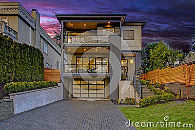 Luxury modern home exterior at sunset Stock Photo