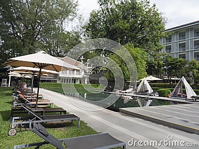 Luxury outdoor swimming pool in a hotel resort Stock Photo