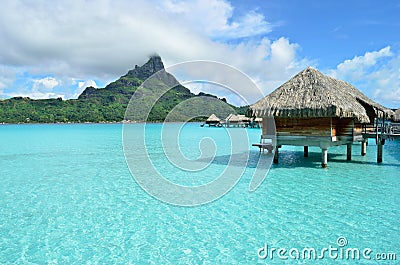 Luxury overwater vacation resort on Bora Bora Stock Photo