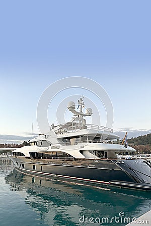 luxury private yacht, motor boat CHECKMATE with 5 cabins from Benetti shipyards in Mediterranean Sea in marina of Spanish city Editorial Stock Photo