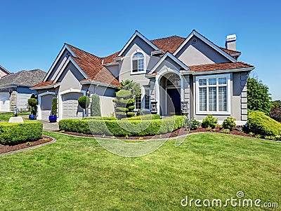 Luxury residential house with perfectly kept front garden. Stock Photo