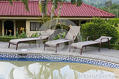 Luxury Resort Hotel and Swimming Pool Lounge Area Stock Photo