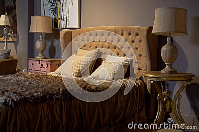 Luxury and rich hotel room. Glamorous, elegant baroque dream bedroom design interior. Brown, beige colour, nobody Stock Photo