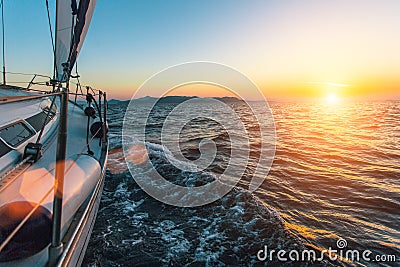 Luxury sailing ship yacht boat in the Aegean Sea during beautiful sunset. Nature. Stock Photo