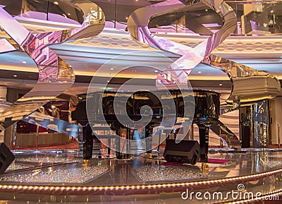 Luxury sparkling interior with Grand piano and floor with rhinestones on cruise liner MSC Meraviglia, 8 October 2018 Stock Photo