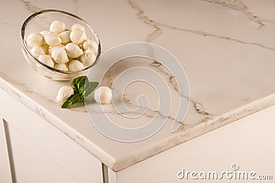 Luxury white kitchen marble countertop. Marble counter concept. White carrara counter. Stock Photo