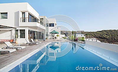 Luxury white villa with swimming pool Stock Photo