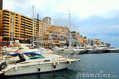 Luxury yachts in the port Hercules and cityview in Monte Carlo, Editorial Stock Photo