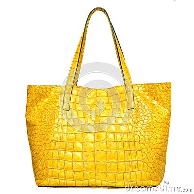 Luxury yellow leather female bag isolated on white Stock Photo