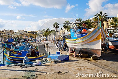 Luzzu famous fishing boats in Marsaxlokk - Malta Editorial Stock Photo