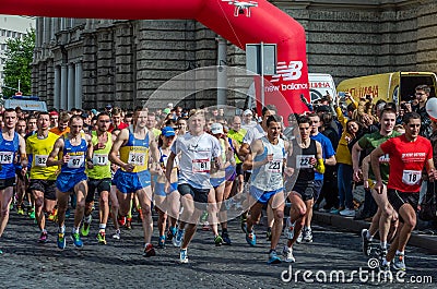 LVIV, UKRAINE - APRIL, 2016: Participants of marathon athletes run start take on Prospect of Freedom in Lviv, Ukraine Editorial Stock Photo