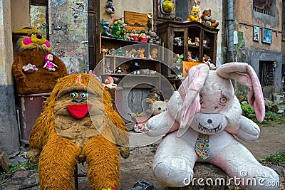 Lviv, Ukraine - April 28, 2018: yard abandoned toys of children, including dolls, teddy bears, monkeys and many others Editorial Stock Photo