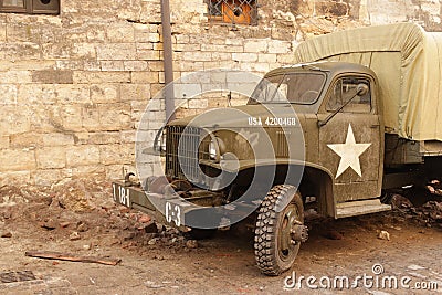 Lviv, Ukraine - 9 9 2019: Army american cars on a street destroyed by war. Scenery for the Holocaust feature film during Editorial Stock Photo
