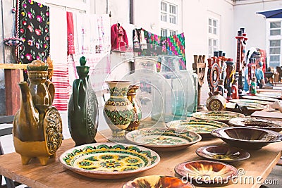 Lviv, Ukraine - August 09, 2020 : garage sale Tlum and Kram. Different traditional ukrainian ceramic dinnerware - plates Editorial Stock Photo