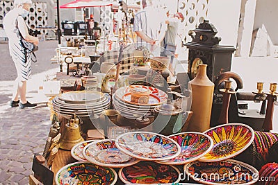 Lviv, Ukraine - August 09, 2020 : garage sale Tlum and Kram. Traditional ukrainian ceramic dinnerware - ceramic plates Editorial Stock Photo