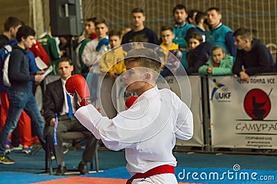 Unknown junior karate player preparing to strike Editorial Stock Photo