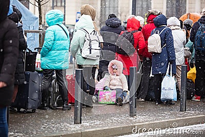 Ukrainian refugees on Lviv railway station waiting for train to escape to Europe Editorial Stock Photo