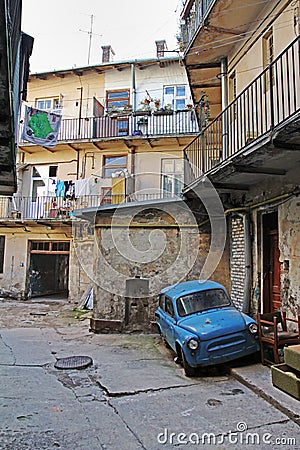 Blue soviet vehicle ZAZ-965 Zaporozhets in the yard in Lviv Editorial Stock Photo