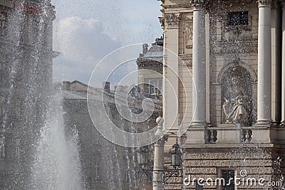 Lviv, Ukraine - Sept 09 2018: A fragment of the opera house in the rays of sunlight and splashes of a fountain. Romance and beauty Stock Photo