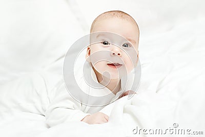 Lying happy baby, three month Stock Photo