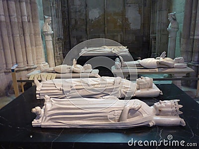 Lying marble statues above tombs in Saint Denis Cathedral in Paris, France. Editorial Stock Photo