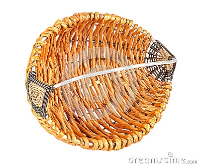 Lying on side empty handmade small wicker basket with wire handle isolated on white background Stock Photo