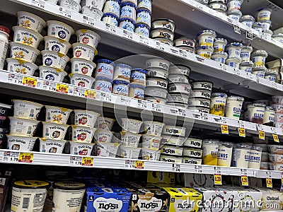 Lynnwood, WA USA - circa July 2023: Wide view of yogurt products for sale inside a QFC grocery store Editorial Stock Photo