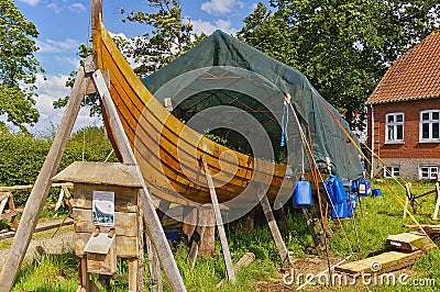 Lyo, Denmark - July 1st, 2012 - Reproduction of a wooden viking longship Editorial Stock Photo