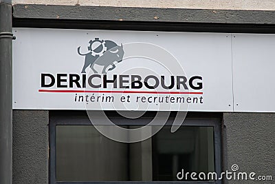 Derichercourg sign logo and text brand on wall building facade Temporary work agency company Editorial Stock Photo