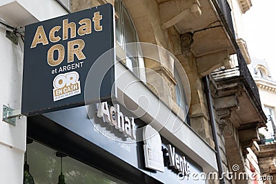 or en cash logo brand and sign text front wall entrance store buying golden french shop gold to Editorial Stock Photo