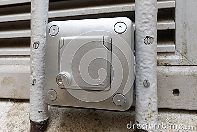 Legrand brand logo on lock silver grey modern padlock on home door wall Lock Box with text sign Editorial Stock Photo