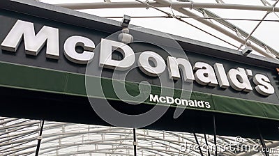 McDonald's fastfood restaurant text sign and logo brand of American fast food company Editorial Stock Photo