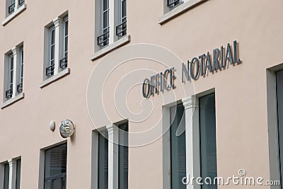 office notarial Notaire french office entrance facade text brand and sign logo notary french in Editorial Stock Photo