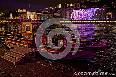 Bombers boat ready on Saone river banks during Festival of Lights Editorial Stock Photo