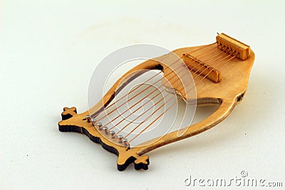 Lyre isolated against light background Stock Photo