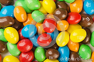 M&M`s candies, Close up of a pile of colorful chocolate coated candy Editorial Stock Photo